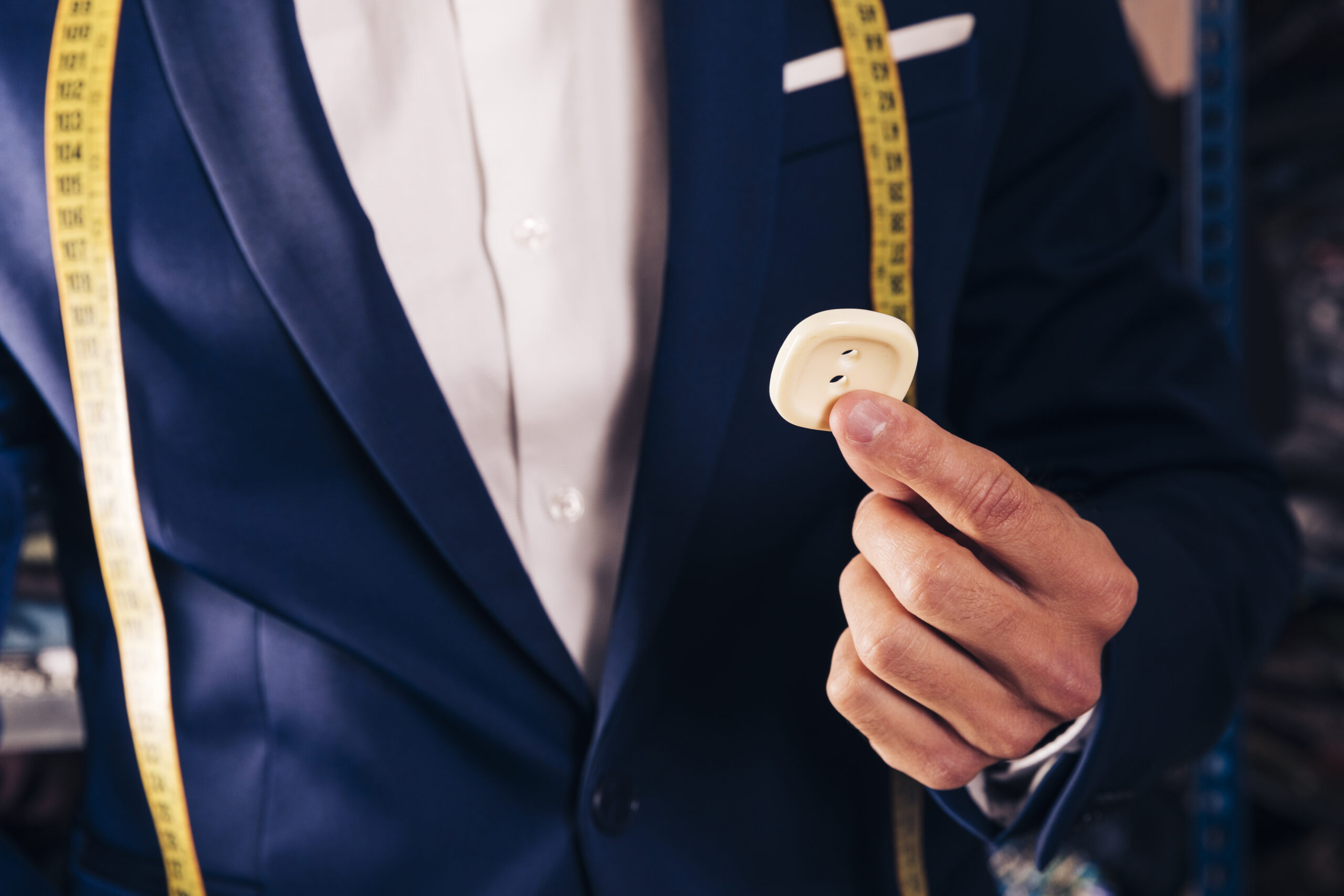 Custom suit lapels buttons stitching and finishing details
