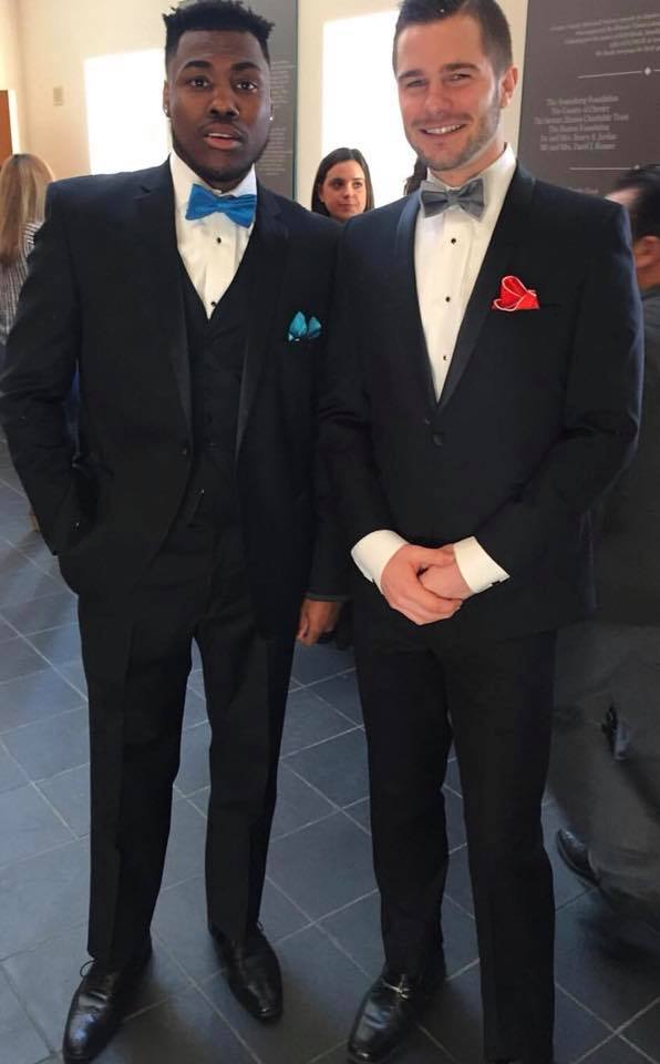 Professional custom suit fitting at Mainline Custom Clothiers
